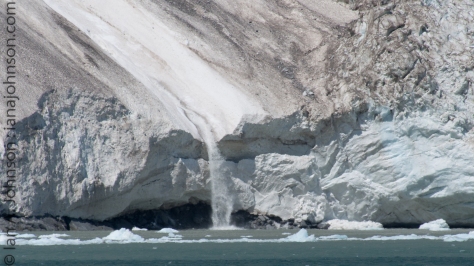 This river of ice and snow is the result of a large chunk of ice which broke away hundreds of feet above. The ice-chute that it slid down poured slush and chunks into the ocean. 