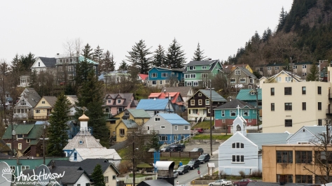 The steep hillsides of Juneau, and the surrounding mountains forces buildings to be built on high-grade slopes. Here's a colorful array of buildings in upper, down-town Juneau as seen from the boardwalks. 